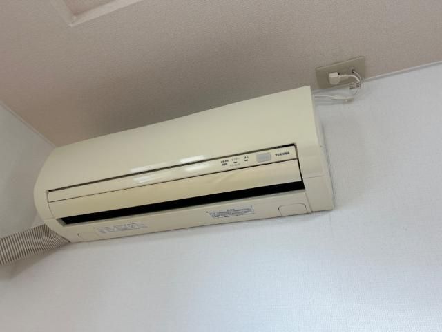 y̑ݔz@