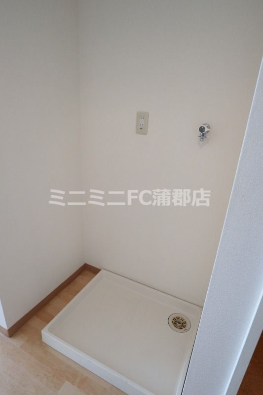 y̑ݔz@