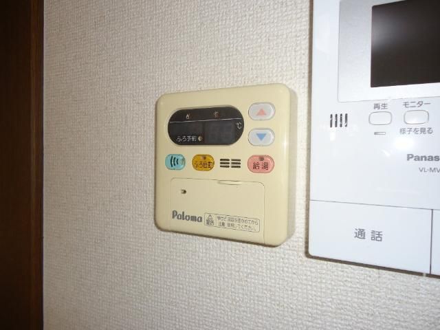 y̑ݔz@