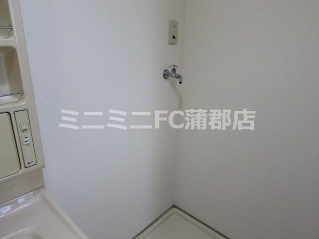 y̑ݔz@