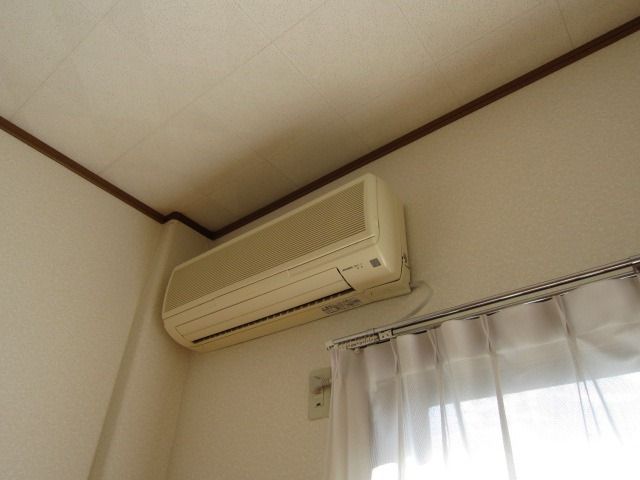 y̑ݔz@