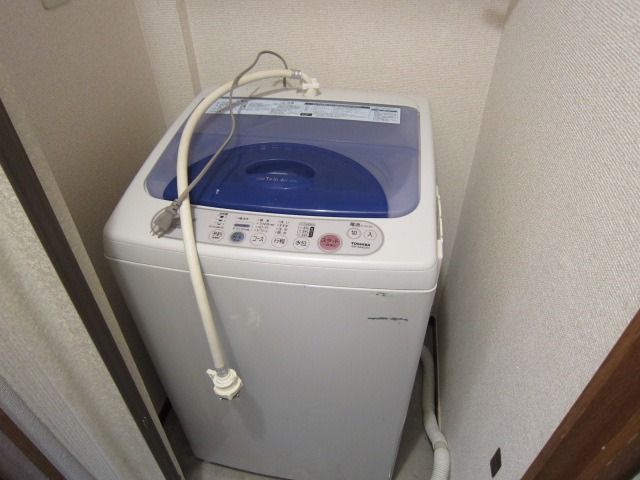 y̑ݔz@